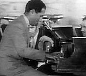 Gershwin playing I Got Rhythm at the opening of the Manhattan Theatre, New York, August, 1931